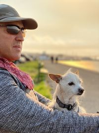 Portrait of man wearing sunglasses against sky