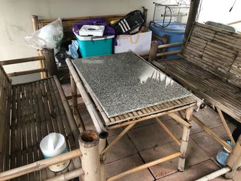 High angle view of chairs on table