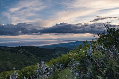 Scenic view of landscape against sky during sunset