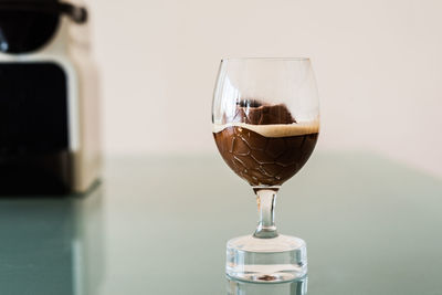 Close-up of beer in glass on table