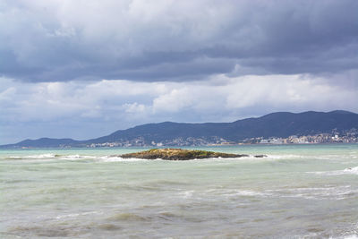 Scenic view of beach against sky