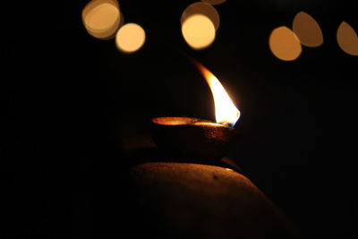 Close-up of lit candle