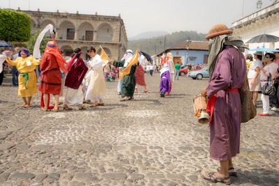 People performing on street during semana santa