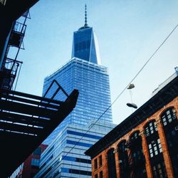 Low angle view of skyscrapers against sky