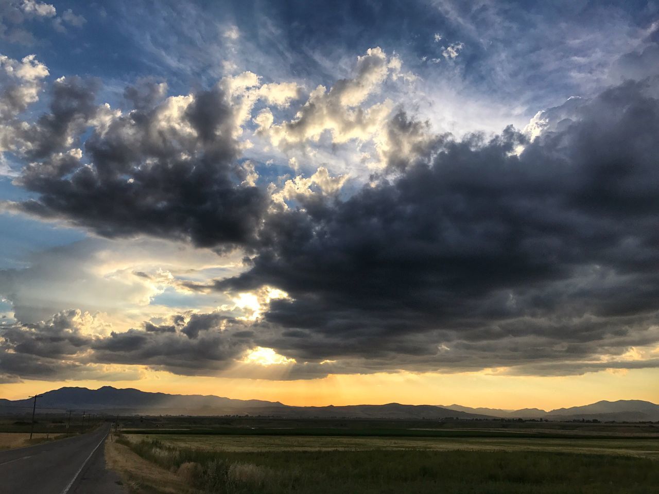 cloud - sky, sky, scenics, sunset, nature, tranquility, tranquil scene, beauty in nature, dramatic sky, landscape, sun, outdoors, no people, the way forward, road, day