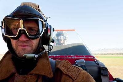 Man traveling in biplane