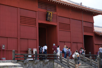 People standing outside building