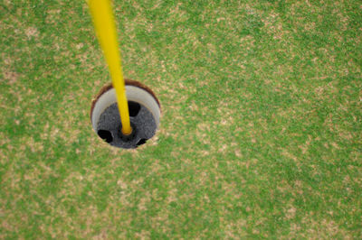 High angle view of flagpole on golf course