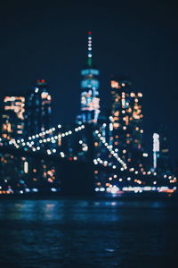 Illuminated buildings in city at night