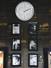 Close-up of clock on wall