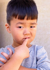 Portrait of cute boy looking away