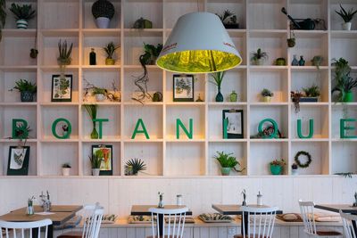 Empty chairs and tables in restaurant