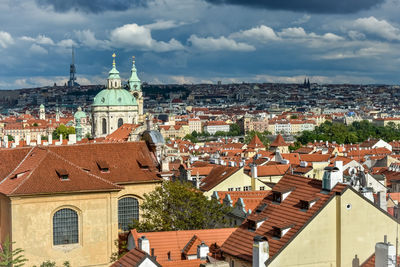 High angle view of buildings in city against sky