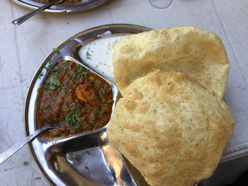 High angle view of bread in plate on table