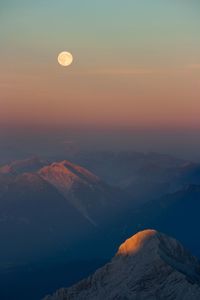 Scenic view of mountains against sky during sunset