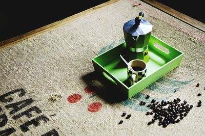 Coffee pot and cup in tray