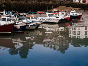 View of boats moored at harbor