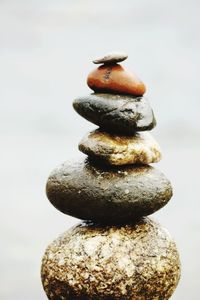 Close-up of stone stack on rock