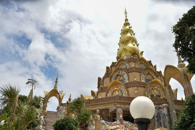 Low angle view of temple against building