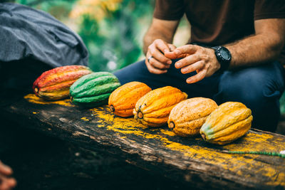 Midsection of man preparing food