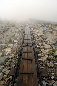 Railroad tracks against sky