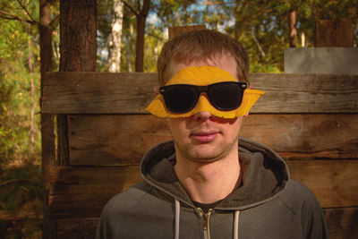 Portrait of young man wearing sunglasses