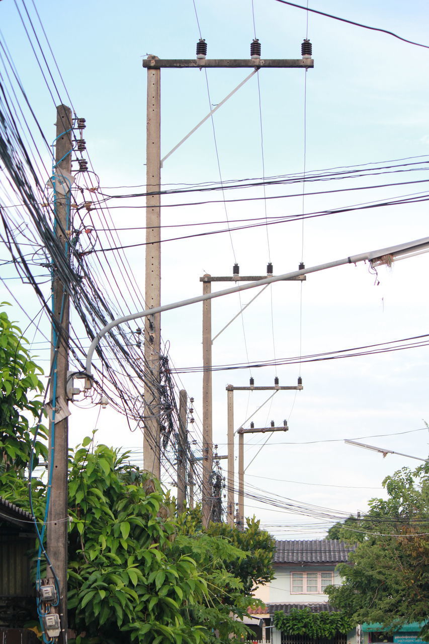 LOW ANGLE VIEW OF ELECTRICITY PYLONS AGAINST SKY