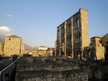 Low angle view of old ruin against sky