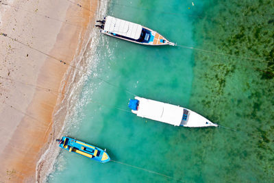 Aerial view of boats moored at shore