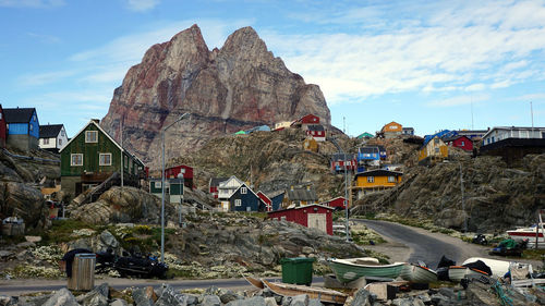 Buildings in city against sky