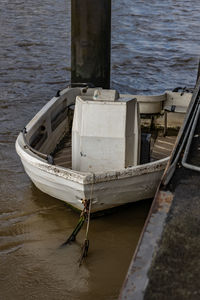 High angle view of fishing boat moored at sea