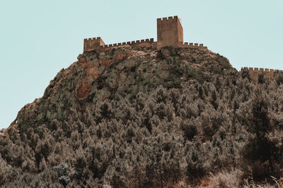 Low angle view of fort against sky