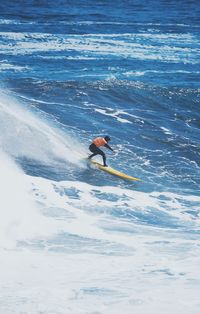 Man surfing in sea