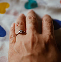 Close-up of hand wearing ring