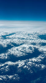 Aerial view of snow covered landscape