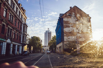 Road in city against sky