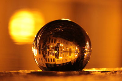 Close-up of illuminated crystal ball