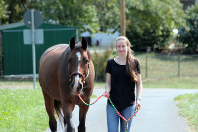 Portrait of girl with horse