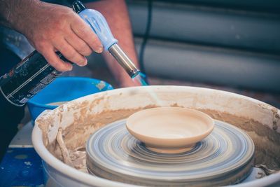 Midsection of person working