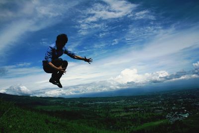 Jump over the mountains with the vast expanse of sky