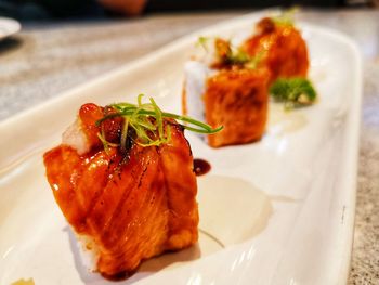 Close-up of food served in plate on table