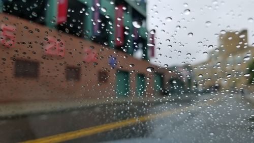 Wet glass window in rainy season