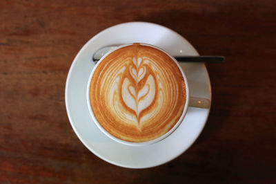 Directly above shot of cappuccino on table