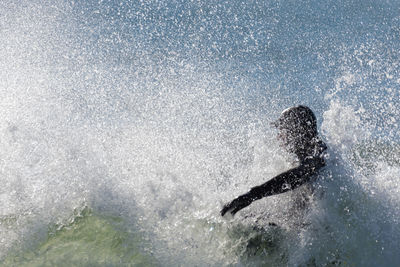 Man swimming in sea