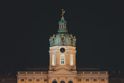 Berlin cathedral against sky at night
