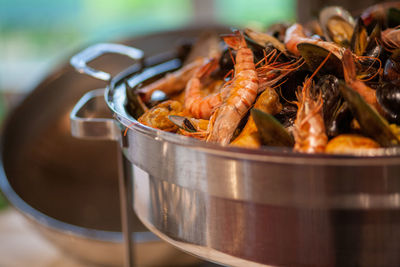 Close-up of seafood in container on table