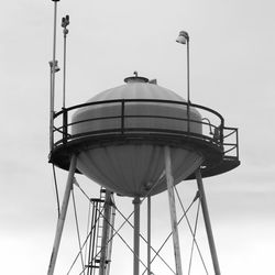 Low angle view of water tower against clear sky