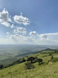 Scenic view of land against sky