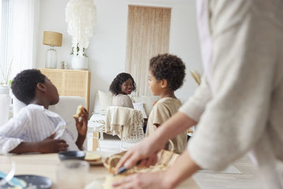 Family working and having meal at home