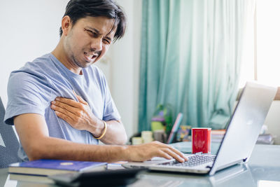 Man working on table